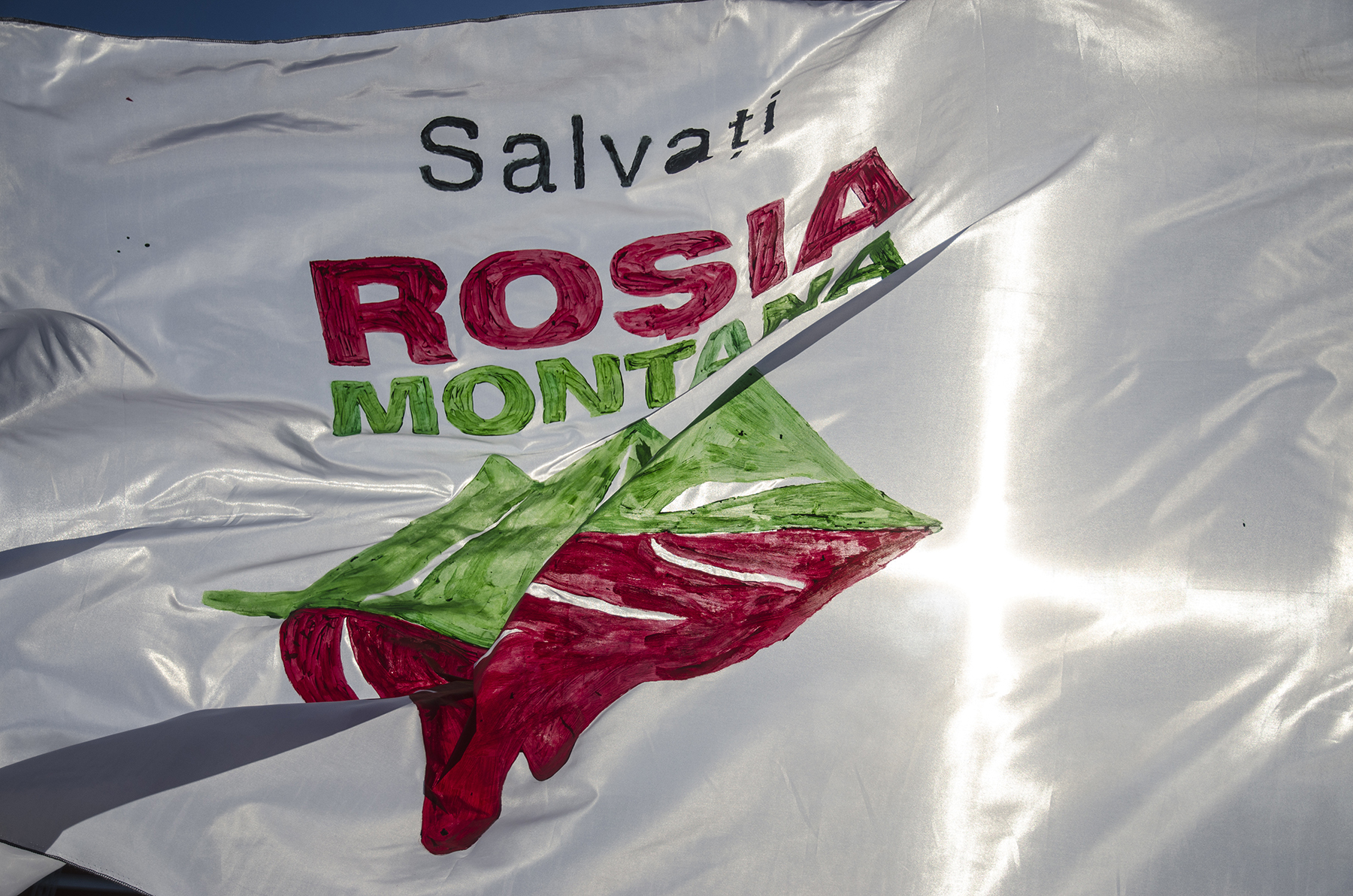 The logo of the Save Rosia Montana campaign was hand-drawn on thousands of banners.